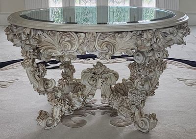 Lalique France Ornate Carved Wood Table With Glass Top. Lalique has been known to manufacture 