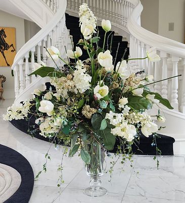 Faux Floral Arrangement In Clear Glass Vase. Flowers Include Roses, Hydrangeas, &amp; More. 