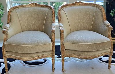 Pair Of Louis XVI Style Arm Chairs. Carved Wood Design With Distressed Look. A Rounded 