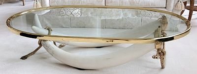 Valenti Hollywood Regency Faux Tusk Coffee Table Retails for $6996. Features Glass Top &amp; 
