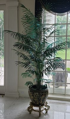 Faux Palm Asian Style Planter With Floral Motif. Base 25" Tall, With A 20" Diameter. Height With 