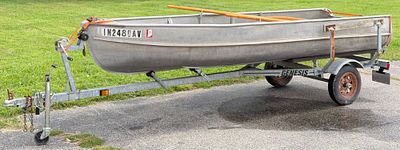 1970 Alumacraft Aluminum Rowboat & 2008 Genesis Trailer. This is a classic Alumacraft unpainted 