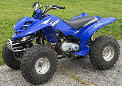 2006 Youth Size Yamaha Raptor 80. This youth-sized Yamaha Raptor 80 all-terrain vehicle (ATV) 