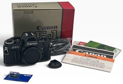 Canon AE-1 35mm Film SLR Camera In Original Retail Box. This item was often only accessible to 