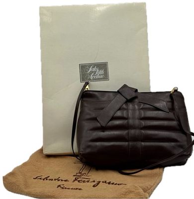 Vintage Salvatore Ferragamo Brown Leather Shoulder Bag. This Vintage Ferragamo bag features a 
