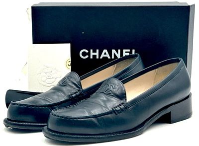 Vintage Chanel Stitched CC Loafers in Box, Size 9. This pair of Vintage Chanel loafers come 