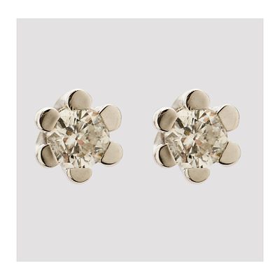 Pendientes en oro blanco con diamante talla brillante engastado en garras. Peso diamante: 0,20 