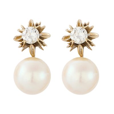 Pendientes tu y yo en oro blanco con diamante talla brillante engastado en garras y perla 