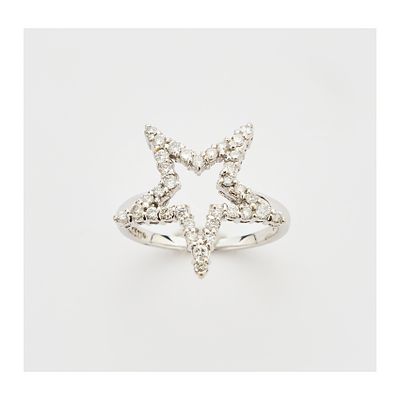 Sortija diseño estrella calada en oro blanco con diamantes talla brillante engastados en 