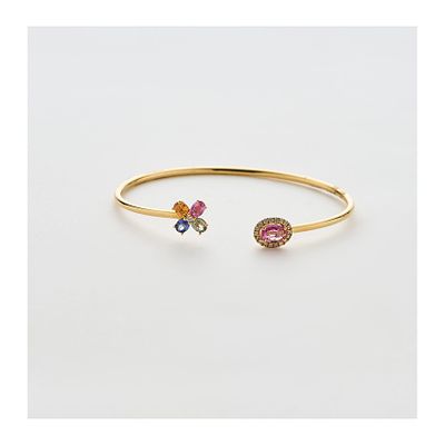 Pulsera esclava diseño abierto en oro con finales rematados por rosetón y flor de zafiros