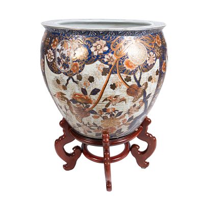 Gran jardinera oriental en porcelana china con decoraciones florales y de aves en cartelas 
