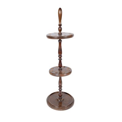 Bastonero en madera de nogal torneada compartimentado para ocho bastones, s.XX. 102 x 31 cm.