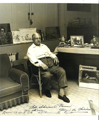[MUSIC AUTOGRAPHS] - GIORGIO DE CHIRICO (1888–1978) - Inscribed and Signed Photograph in his 