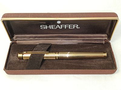 Sheaffer fountain pen in steel and plate with 14K gold nib, with case