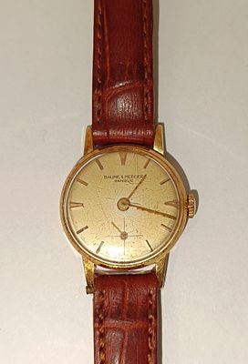 Rel&oacute;gio Baume &amp; Mercier de senhora em ouro 750%