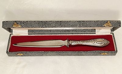 Letter opener with silver handle, includes case