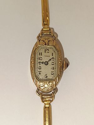 Rel&oacute;gio de senhora em ouro 585% 14K marca VIDAR com bracelete em ouro e coroa em cabuchon de 