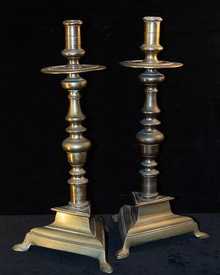 Pair of Candlesticks. Pair of bronze candlesticks with triangular bases.Dimensions: 41 x 21.5 x 