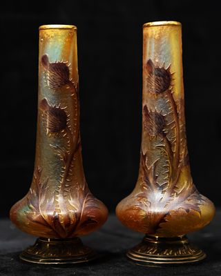 Pair of Art Nouveau jugs. Pair of Art Nouveau glass jugs with French silver bases. C. 1900.T&ecirc;te 