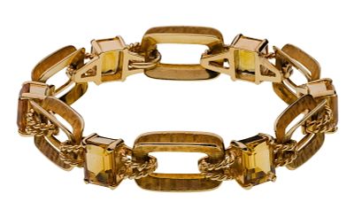 14k Yellow Gold and Citrine Bracelet Having rounded rectangular links and cushion cut citrines 