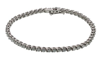 Platinum and Diamond Bracelet Having round cut diamonds set in a tennis style bracelet 