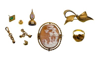 18k Gold Jewelry Assortment Including a ring, (2) pins, a tie tack having an emerald, (2) 
