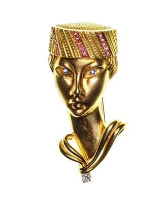18k Yellow Gold, Sapphire, Ruby and Diamond Bust Brooch Figural style having gemstone accents 