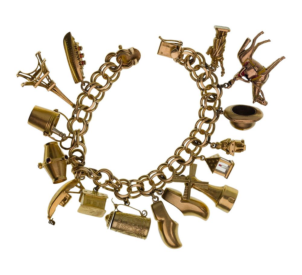 Lot 232: 14k Yellow Gold Charm Bracelet and Mixed Gold Charm Assortment