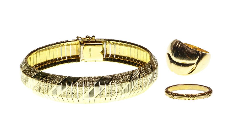 Lot 209: 14k Yellow Gold Ring and Bracelet Assortment