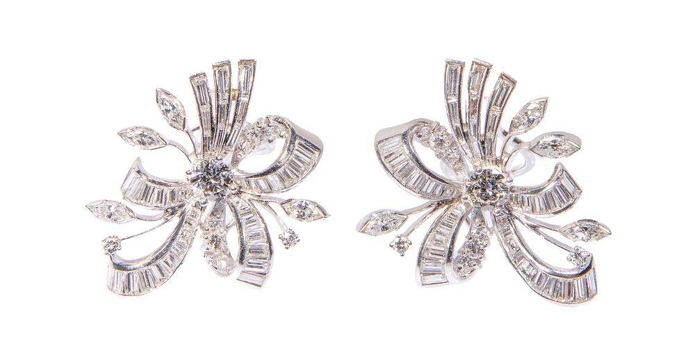 Lot 156: Platinum and Diamond Pierced Earrings