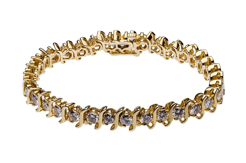 Lot 158: 14k Yellow Gold and Diamond Tennis Bracelet