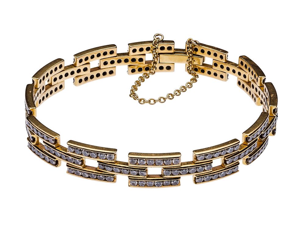 Lot 185: 14k Yellow Gold and Diamond Bracelet