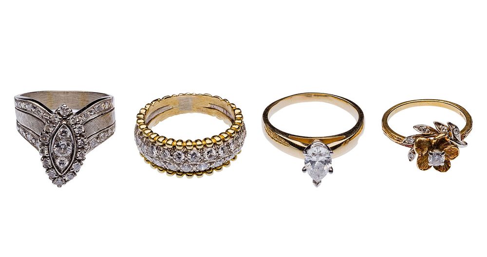 Lot 180: 18k and 14k Yellow Gold and Diamond Ring Assortment