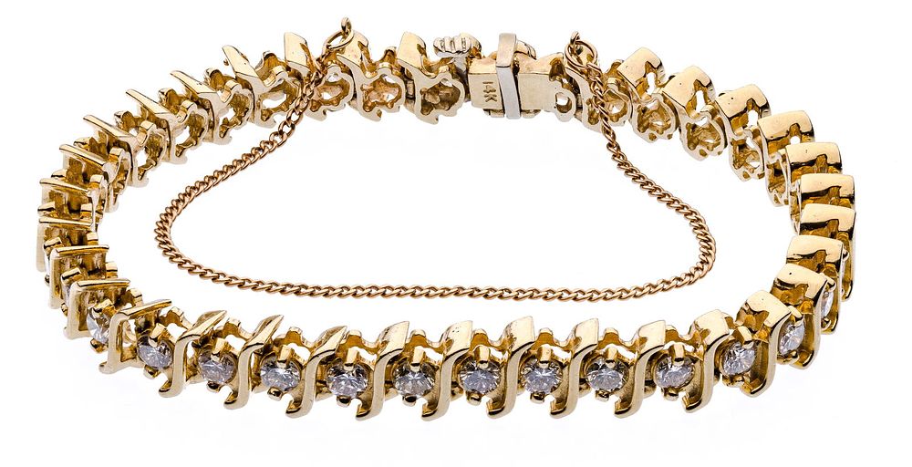 Lot 210: 14k Yellow Gold and Diamond Tennis Bracelet