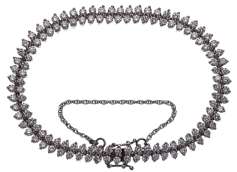 Lot 234: 14k White Gold and Diamond Tennis Bracelet
