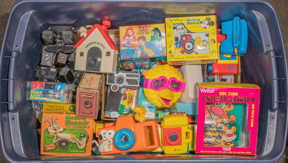 Lot 354: Toy Camera and Swatch Watch Assortment