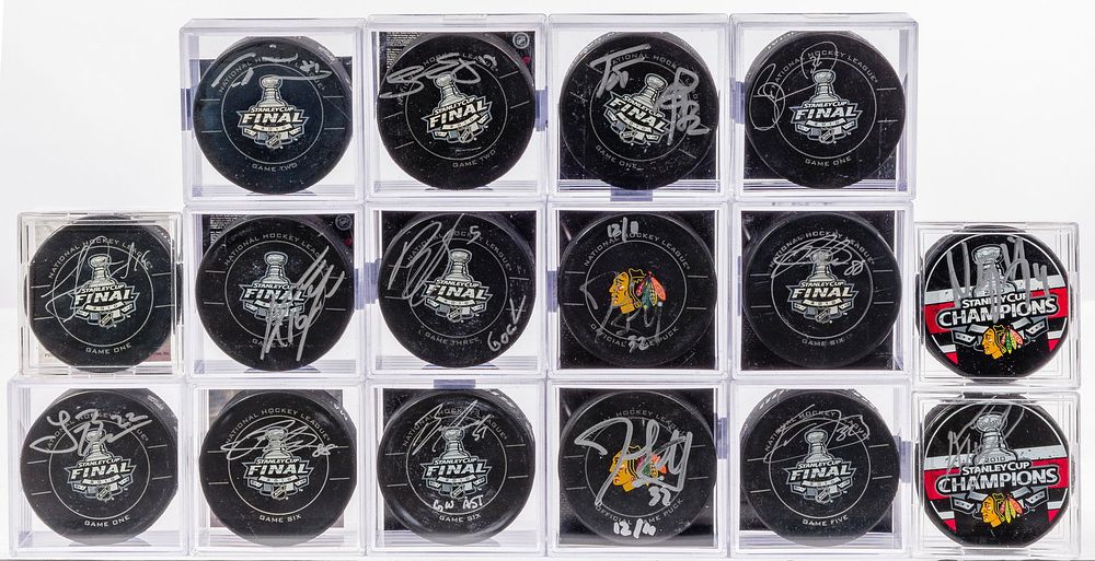 Lot 312: Chicago Blackhawks 2010 Signed Hockey Puck Assortment