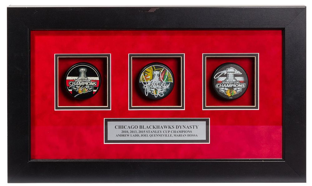 Lot 322: Chicago Blackhawks Signed Hockey Puck Display