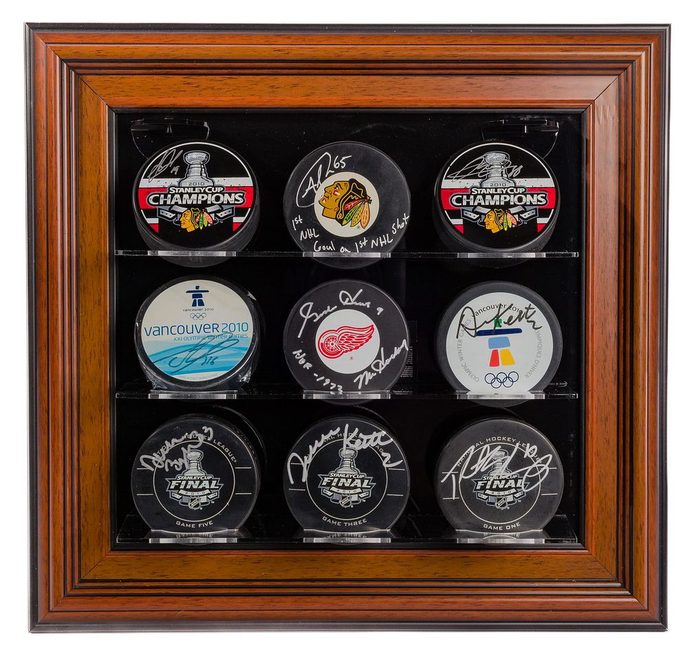 Lot 330: NHL Signed Hockey Puck Assortment