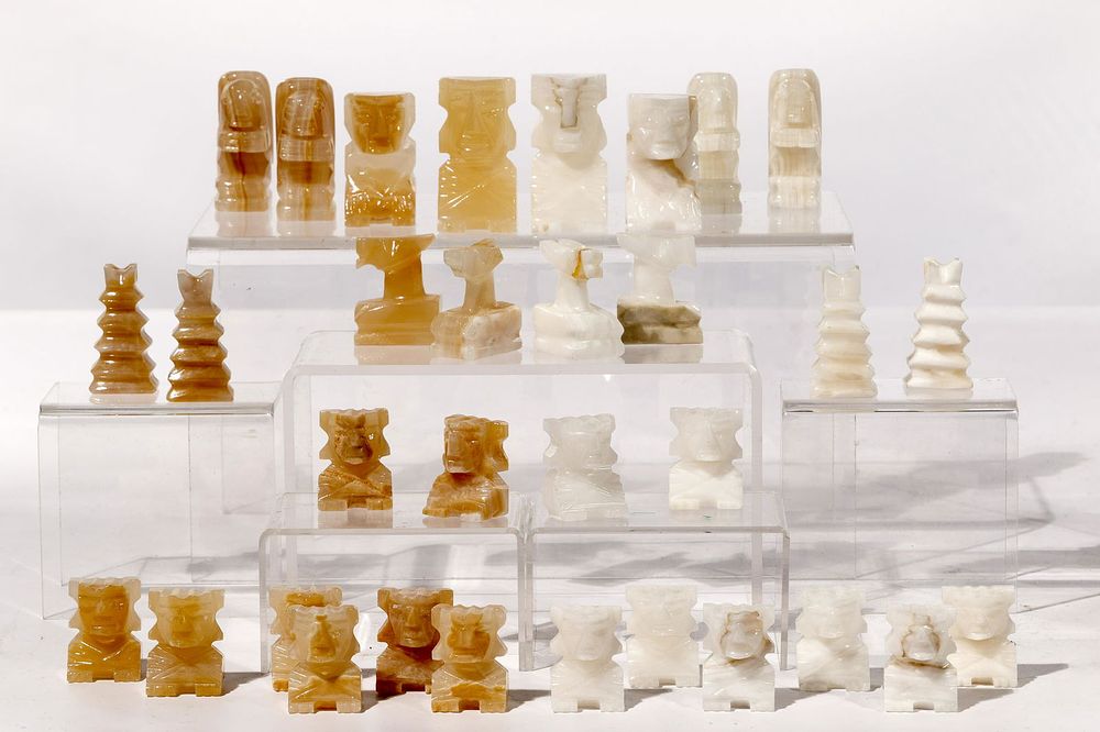Lot 205: Carved Stone Chess Piece Set Assortment