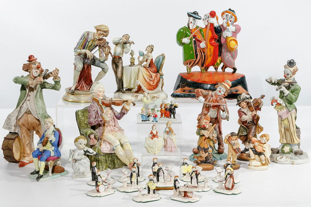 Lot 256: Violin Figurine Assortment