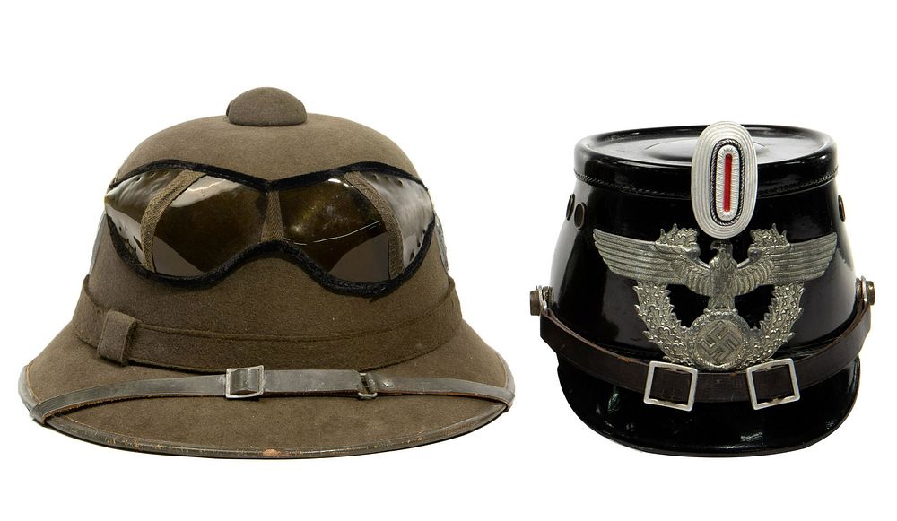 Lot 352: World War II German Police Tschako and African Corps Pith Helmet