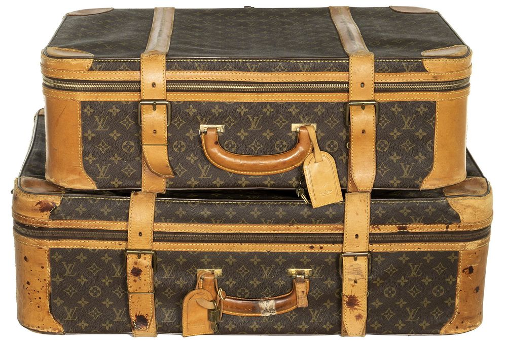 Lot 439: Louis Vuitton Monogrammed Canvas and Leather Suitcases