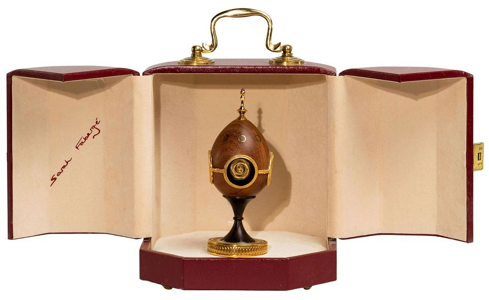 Lot 462: Sarah Faberge 'Turners Tribute Egg' Wood Figurine