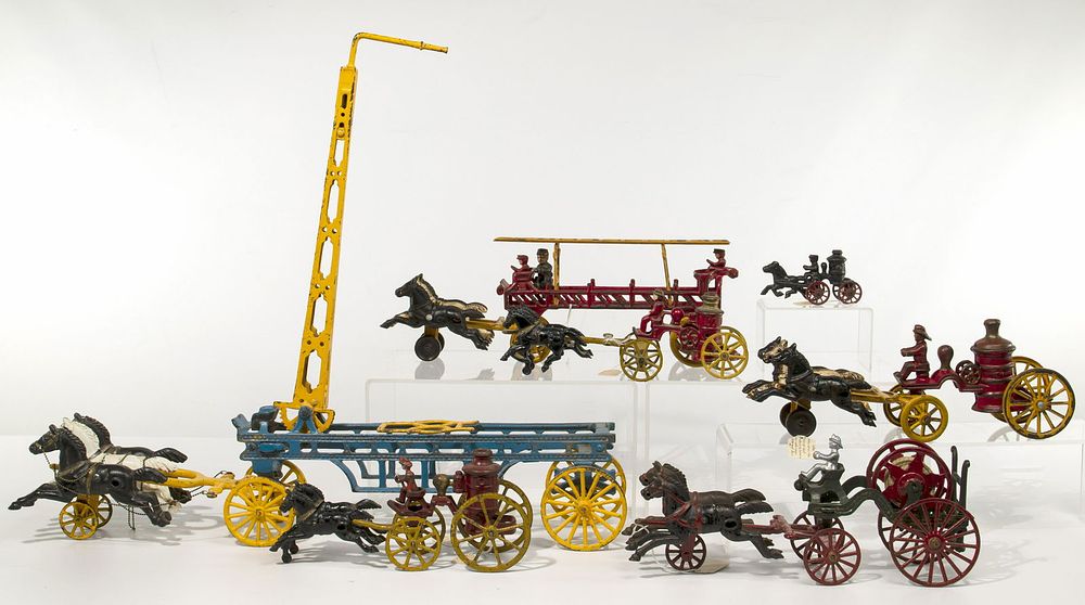 Lot 243: Cast Iron Horse Carriage Fire Truck Assortment