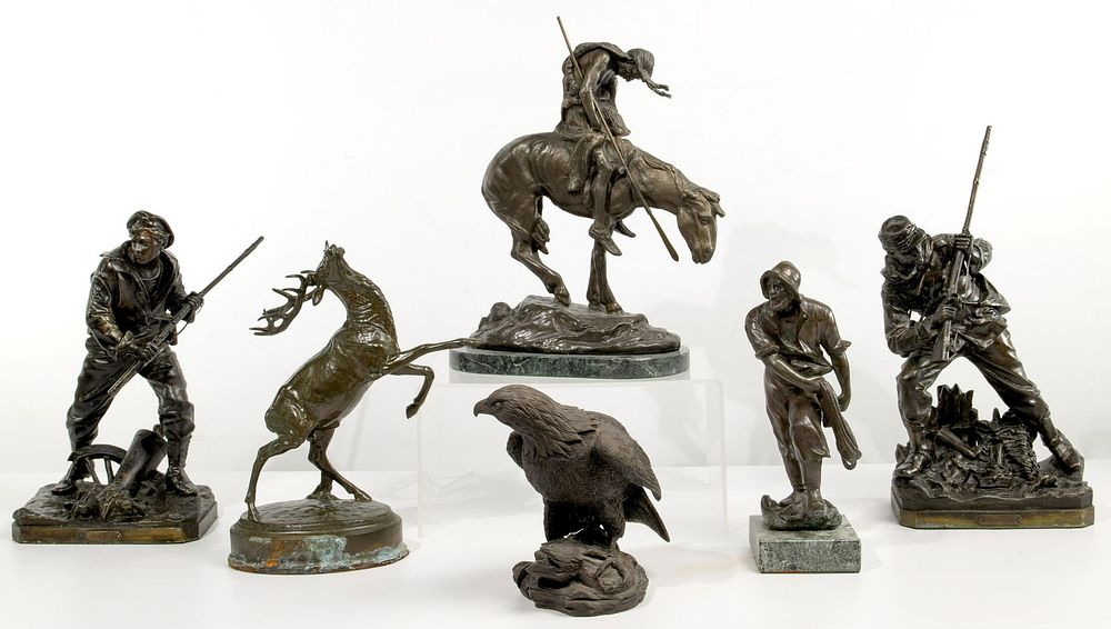 Lot 539: Metal and Resin Statue Assortment