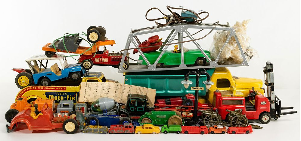 Lot 323: Tin and Plastic Toy Car and Truck Assortment