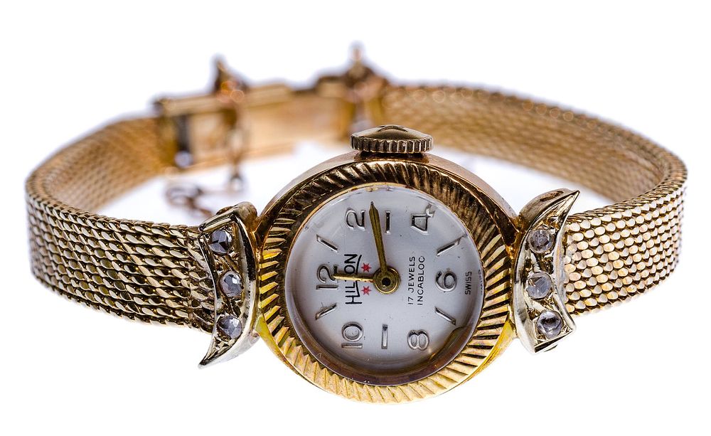 Lot 489: Hilton 18k Yellow Gold Case and Band Wristwatch