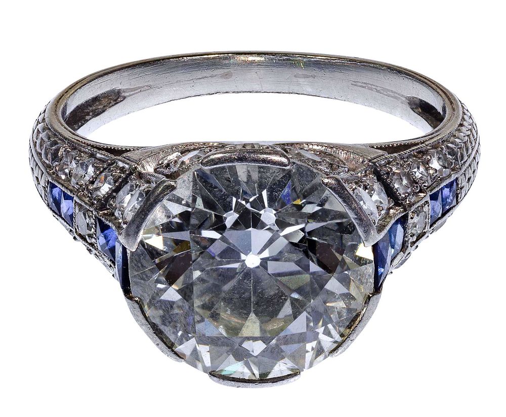 Lot 476: Platinum, Sapphire and 4.37 Carat Diamond Ring