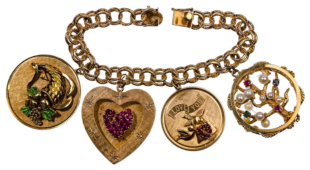 Lot 511: 14k Yellow Gold Charm Bracelet